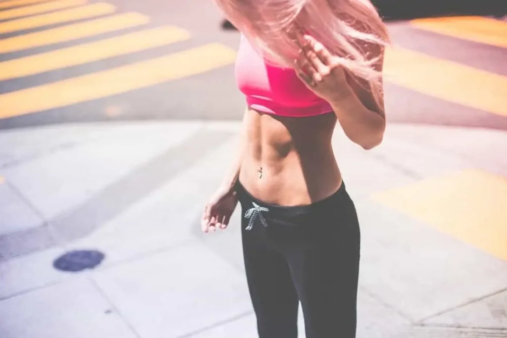 Woman with toned stomach after LA-EMS Body Sculpting Treatment Houghton Regis